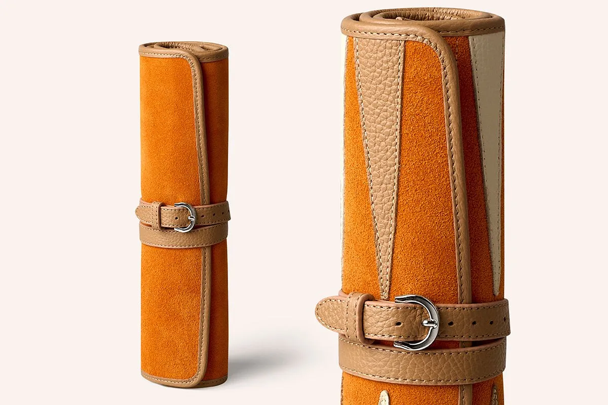 Hector Saxe's Backgammon de Voyage, a leather board that rolls up for travel.
