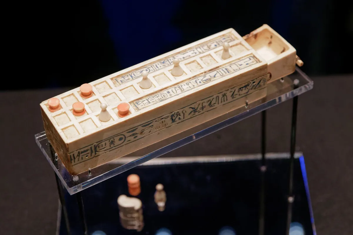 A miniature ivory senet box from the tomb of Tutankhamun, shown in Paris. The boy king took his games with him.