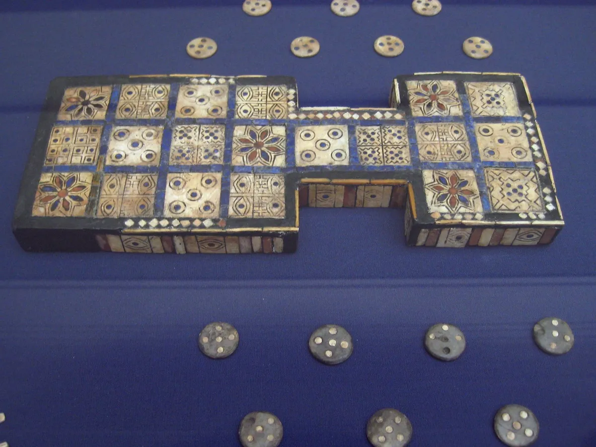 The Royal Game of Ur, from the Royal Cemetery at Ur, c. 2600 to 2400 BC, now in the British Museum. It is the oldest game whose rules have…