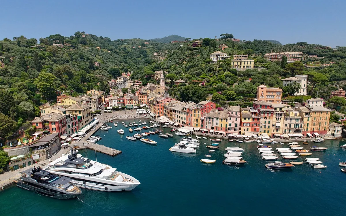 Portofino on the Italian Riviera, where summer dressing means linen, short tailored shorts and leather shoes.