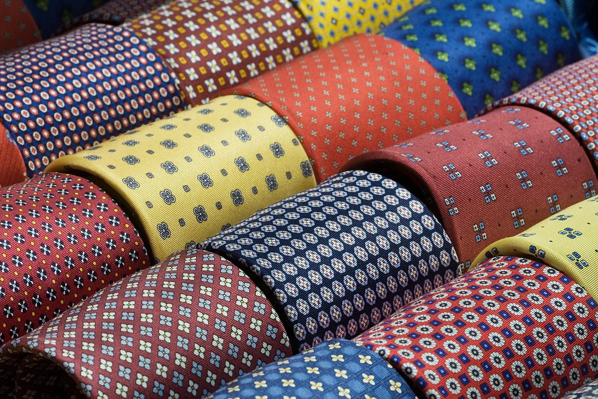 Small, regular patterns in silk are the safe zone for business ties.