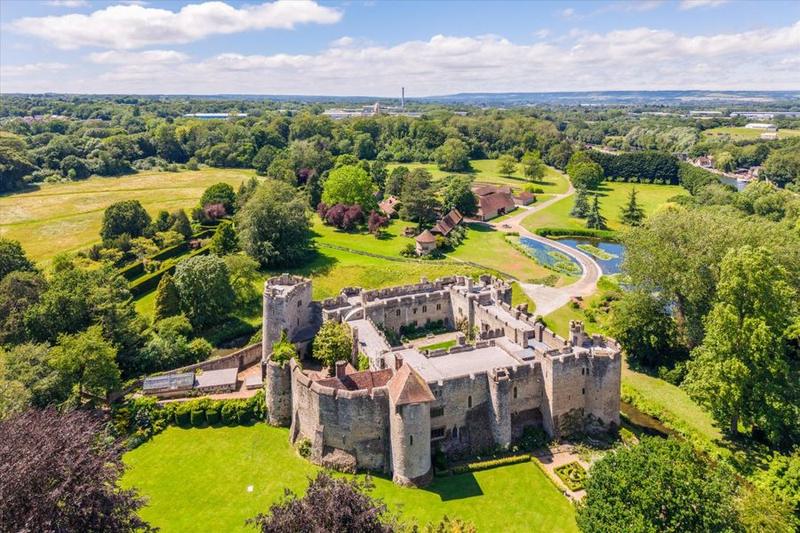 A 700-year-old Kent castle with a moat, a jousting yard, 42 acres and nine cottages. In Manhattan, that buys you a two-bedroom.