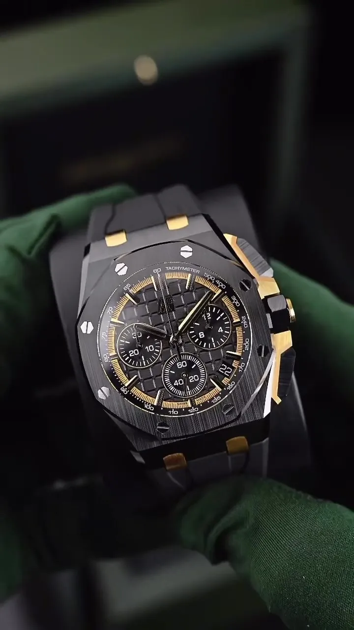 Black ceramic, 18k gold accents and a black Méga Tapisserie dial, with the full AP box and a second alligator strap.
