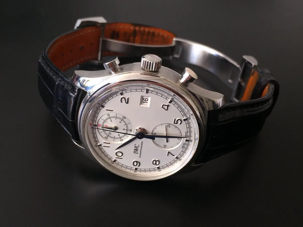 An IWC chronograph on a black leather strap