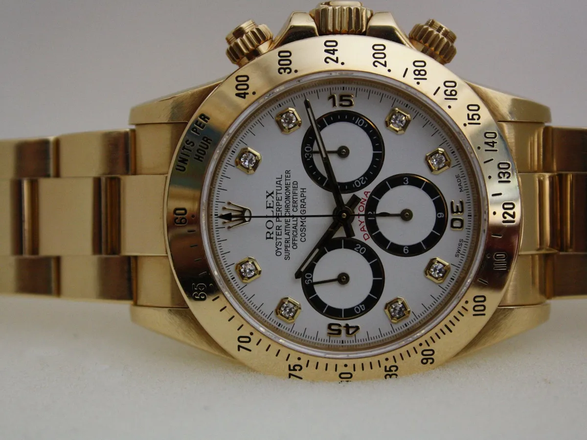 A Rolex Cosmograph Daytona in yellow gold